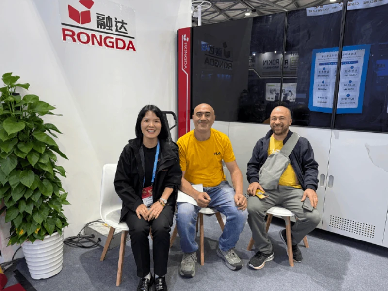 Customer meeting and discussion at the exhibition booth